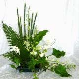 Ikebana arrangement featuring greenery