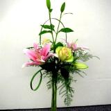 Vertical glass container arrangement Vertical glass container arrangement
