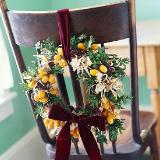 Chair back floral arrangement, photo credit:Better Homes and Gardens